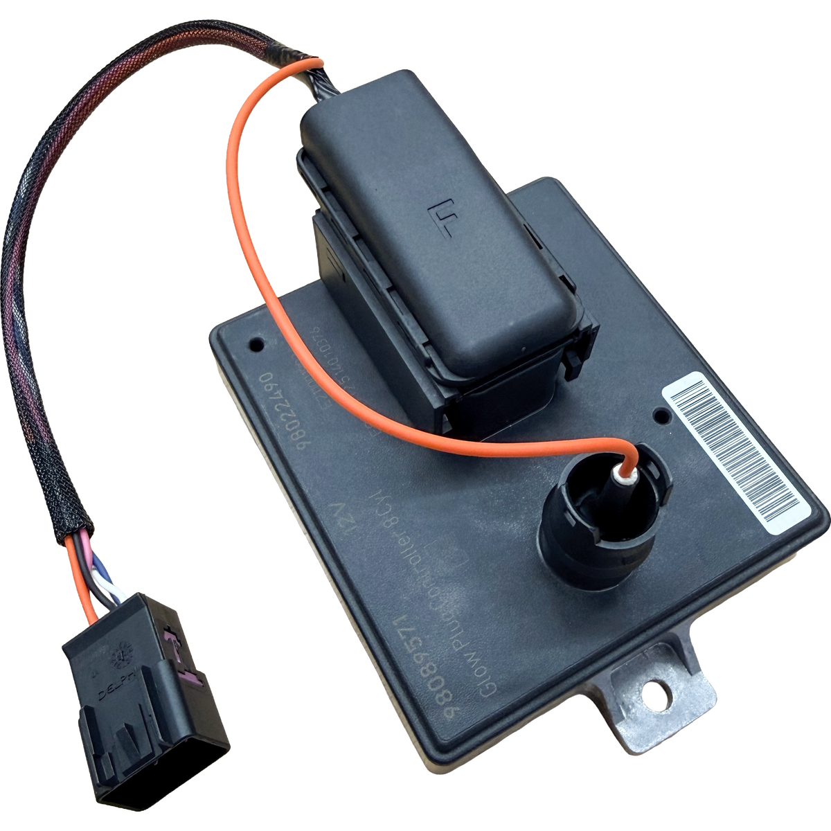 A black automotive Glow Plug Control Module with a mounted connector, and an orange wire.